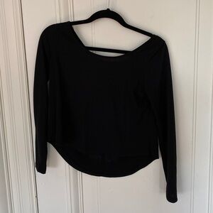 Black Long-Sleeved Top with White Wings